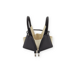 Buy now the Iconic LIA Mini Bag inspired by the geometric shapes of our designer's birth city Barcelona, and its world known artist, Antonio Gaudí, architect of the world wonder La Sagrada Familia. The Iconic Lia Black Mini Bag has a unique and functional pyramidal design able to fit all your essentials.