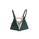 Buy now the Iconic LIA Mini bag inspired by the geometric shapes of our designer's birth city Barcelona, and its world known artist, Antonio Gaudí, architect of the world wonder La Sagrada Familia. The Iconic Lia Cipresso Green Mini bag has a unique and functional pyramidal design able to fit all your essentials.