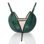 Buy now the Exotic Pilo Handbag inspired by the geometric shapes of our designer's birth city Barcelona, and its world known artist, Antonio Gaudí, architect of the world wonder La Sagrada Familia. The Exotic Pilo Cipresso Handbag has a unique and functional sphere design able to fit all your essentials.