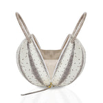 Buy now the Exotic Pilo Handbag inspired by the geometric shapes of our designer's birth city Barcelona, and its world known artist, Antonio Gaudí, architect of the world wonder La Sagrada Familia. The Exotic Pilo Natural Handbag has a unique and functional sphere design able to fit all your essentials.