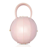Buy now the Iconic Pilo Handbag inspired by the geometric shapes of our designer's birth city Barcelona, and its world known artist, Antonio Gaudí, architect of the world wonder La Sagrada Familia. The Iconic Pilo Pink Handbag has a unique and functional pyramidal design able to fit all your essentials.