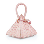 Buy now the Exotic Lia Handbag inspired by the geometric shapes of our designer's birth city Barcelona, and its world known artist, Antonio Gaudí, architect of the world wonder La Sagrada Familia. The Iconic Lia Python Pastel Pink Handbag has a unique and functional pyramidal design able to fit all your essentials.