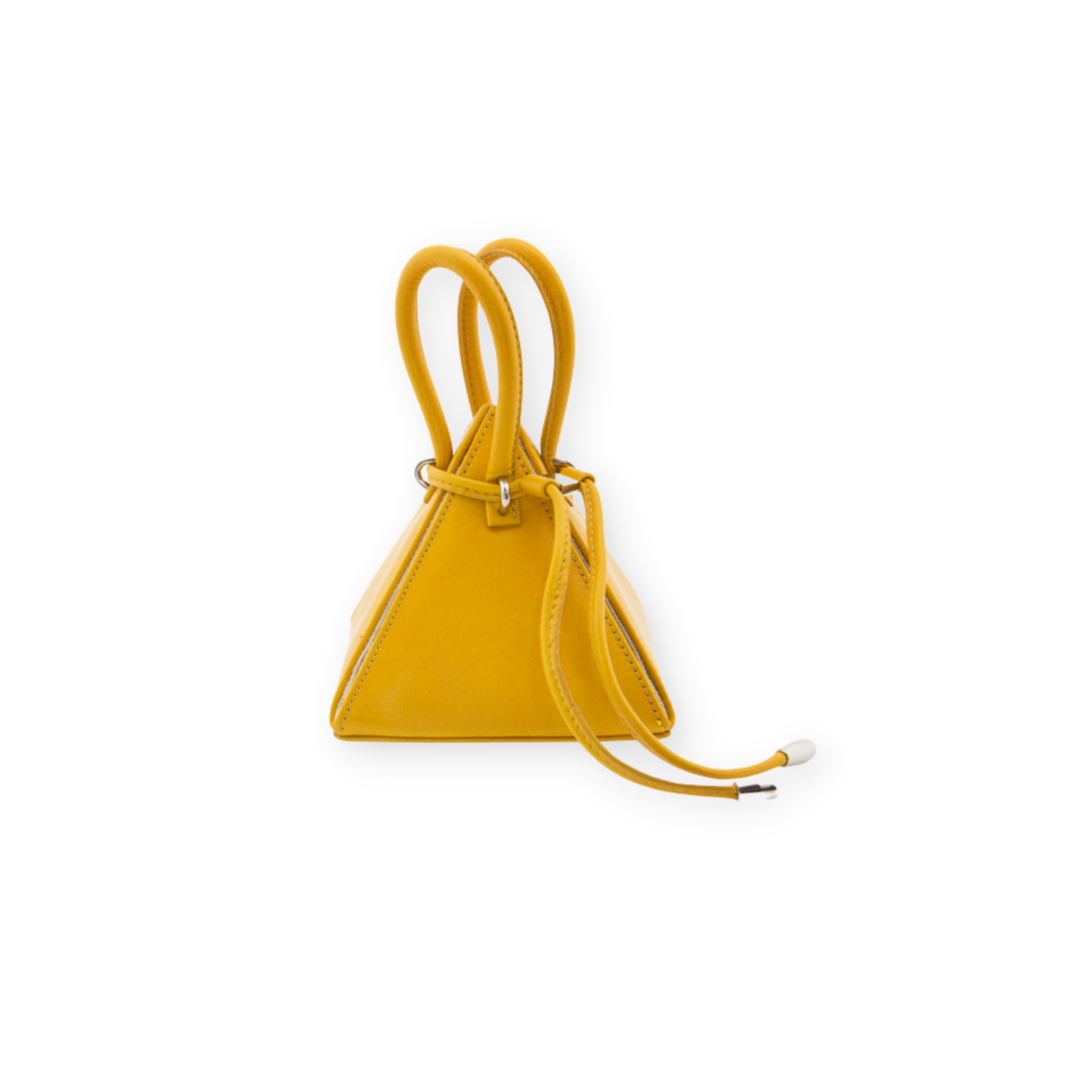 Buy now the Iconic Lia Handbag inspired by the geometric shapes of our designer's birth city Barcelona, and its world known artist, Antonio Gaudí, architect of the world wonder La Sagrada Familia. The Iconic Lia Amber Mini bag has a unique and functional pyramidal design able to fit all your essentials. 