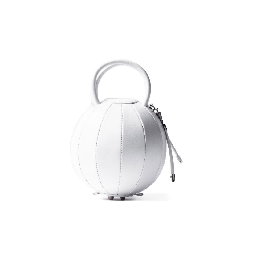 Buy now the iconic Pilo Minibag inspired by the geometric shapes of our designer's birth city Barcelona, and its world known artist, Antonio Gaudí, architect of the world wonder La Sagrada Familia. The iconic Pilo White Minibag has a unique and functional sphere design able to fit all your essentials. 