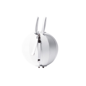 Buy now the iconic Pilo Minibag inspired by the geometric shapes of our designer's birth city Barcelona, and its world known artist, Antonio Gaudí, architect of the world wonder La Sagrada Familia. The iconic Pilo White Minibag has a unique and functional sphere design able to fit all your essentials. 