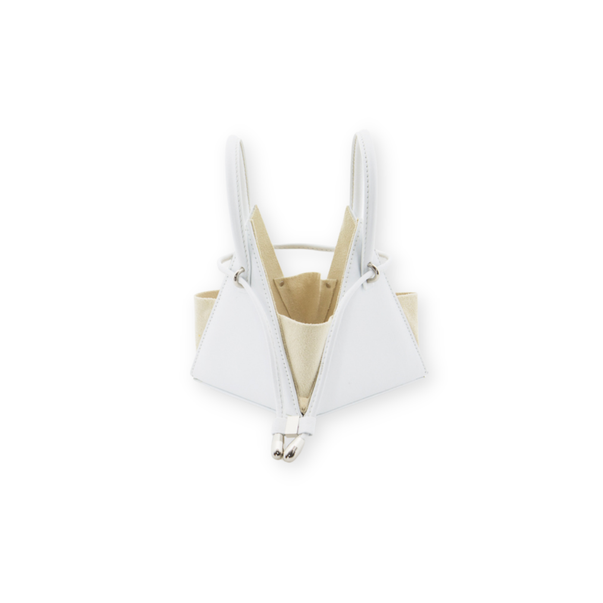 Buy now the Iconic LIA Mini bag inspired by the geometric shapes of our designer's birth city Barcelona, and its world known artist, Antonio Gaudí, architect of the world wonder La Sagrada Familia. The Iconic Lia White Mini bag has a unique and functional pyramidal design able to fit all your essentials. 
