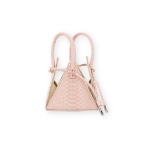 Buy now the Exotic LIA Mini bag inspired by the geometric shapes of our designer's birth city Barcelona, and its world known artist, Antonio Gaudí, architect of the world wonder La Sagrada Familia. The Exotic Lia Python Pastel Pink Mini bag has a unique and functional pyramidal design able to fit all your essentials.