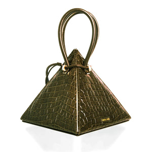 Buy now the Exotic Lia Handbag inspired by the geometric shapes of our designer's birth city Barcelona, and its world known artist, Antonio Gaudí, architect of the world wonder La Sagrada Familia. The Exotic Lia Croc-Embossed Pino Green Handbag has a unique and functional pyramidal design able to fit all your essentials. 