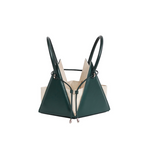 Buy now the Iconic LIA Mini bag inspired by the geometric shapes of our designer's birth city Barcelona, and its world known artist, Antonio Gaudí, architect of the world wonder La Sagrada Familia. The Iconic Lia Cipresso Green Mini bag has a unique and functional pyramidal design able to fit all your essentials. 