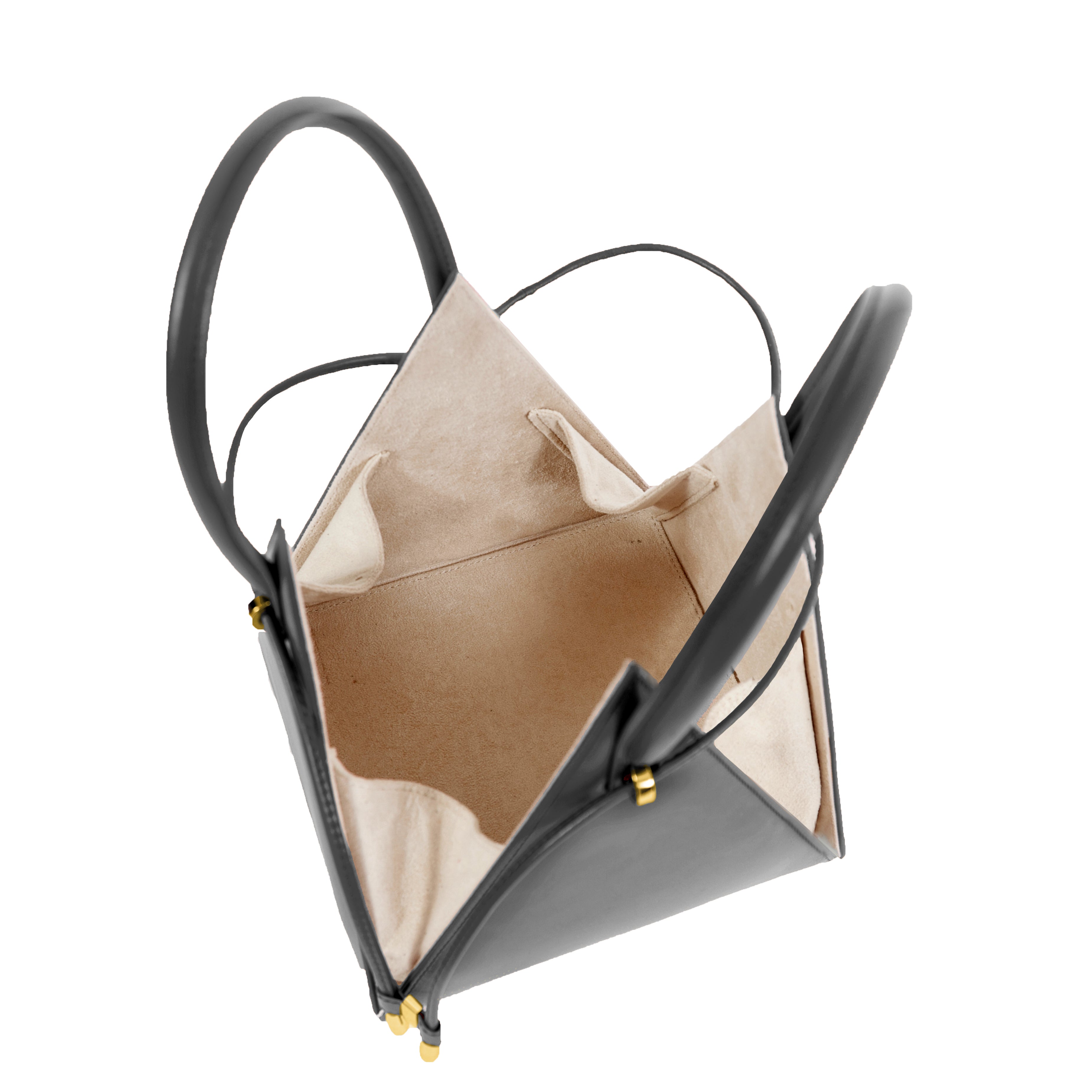 Buy now the Iconic Lia Handbag inspired by the geometric shapes of our designer's birth city Barcelona, and its world known artist, Antonio Gaudí, architect of the world wonder La Sagrada Familia. The Iconic Lia Black Handbag has a unique and functional pyramidal design able to fit all your essentials. 