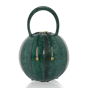Buy now the Exotic Pilo Handbag inspired by the geometric shapes of our designer's birth city Barcelona, and its world known artist, Antonio Gaudí, architect of the world wonder La Sagrada Familia. The Exotic Pilo Cipresso Handbag has a unique and functional sphere design able to fit all your essentials. 