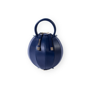 Buy now the iconic Pilo Minibag inspired by the geometric shapes of our designer's birth city Barcelona, and its world known artist, Antonio Gaudí, architect of the world wonder La Sagrada Familia. The iconic Pilo Ocean Blue Minibag has a unique and functional sphere design able to fit all your essentials. 