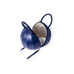 Buy now the iconic Pilo Minibag inspired by the geometric shapes of our designer's birth city Barcelona, and its world known artist, Antonio Gaudí, architect of the world wonder La Sagrada Familia. The iconic Pilo Ocean Blue Minibag has a unique and functional sphere design able to fit all your essentials. 
