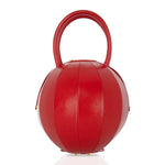 Buy now the Iconic Pilo Handbag inspired by the geometric shapes of our designer's birth city Barcelona, and its world known artist, Antonio Gaudí, architect of the world wonder La Sagrada Familia. The Iconic Pilo Red Handbag has a unique and functional sphere design able to fit all your essentials. 