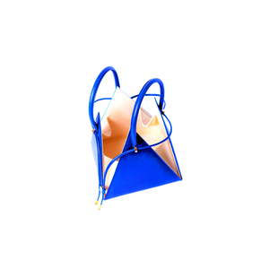 Buy now the Iconic LIA Mini bag inspired by the geometric shapes of our designer's birth city Barcelona, and its world known artist, Antonio Gaudí, architect of the world wonder La Sagrada Familia. The Iconic Lia Electric Blue Mini bag has a unique and functional pyramidal design able to fit all your essentials. 