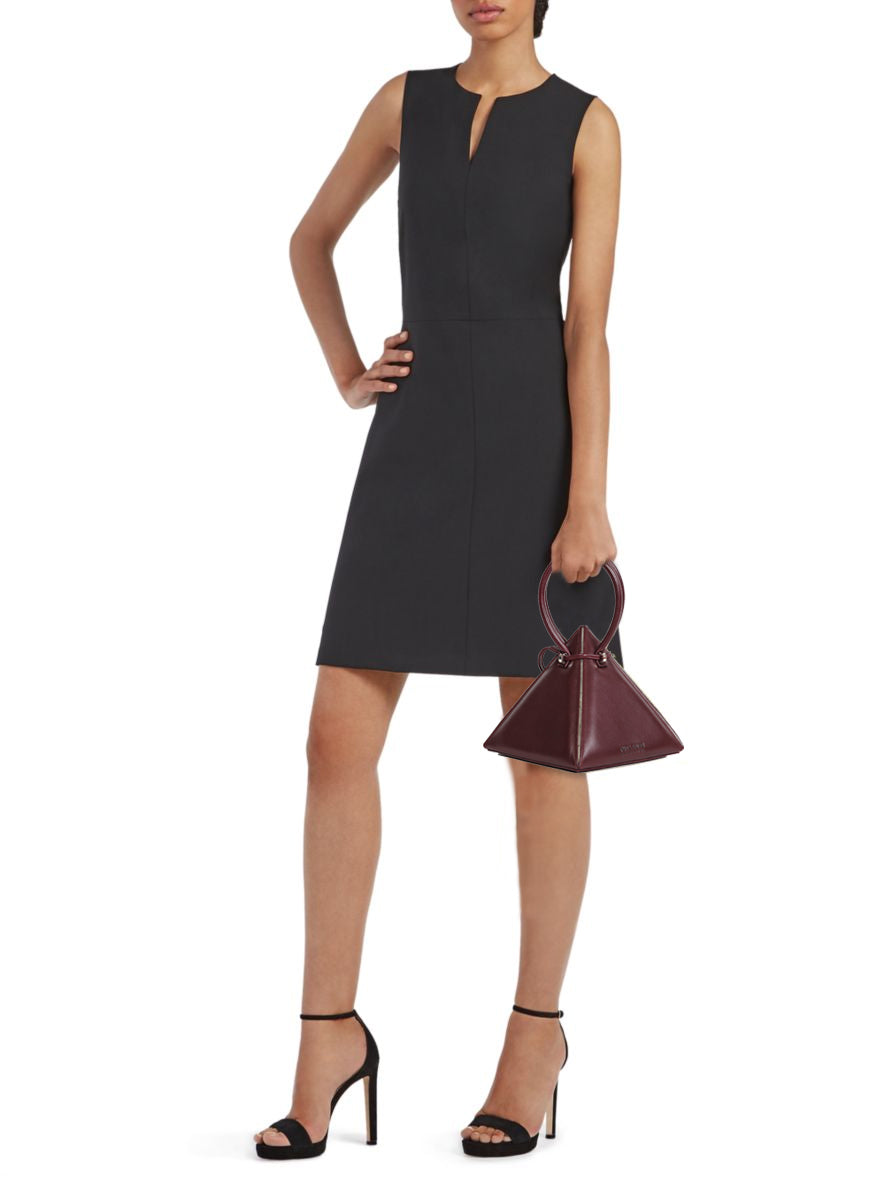 Buy now the Iconic Lia Handbag inspired by the geometric shapes of our designer's birth city Barcelona, and its world known artist, Antonio Gaudí, architect of the world wonder La Sagrada Familia. The Iconic Lia Burgundy Handbag has a unique and functional pyramidal design able to fit all your essentials.