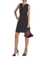 Buy now the Exotic Lia Handbag inspired by the geometric shapes of our designer's birth city Barcelona, and its world known artist, Antonio Gaudí, architect of the world wonder La Sagrada Familia. The Exotic Lia Python Burgundy Handbag has a unique and functional pyramidal design able to fit all your essentials. 