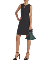 Buy now the Iconic Lia Handbag inspired by the geometric shapes of our designer's birth city Barcelona, and its world known artist, Antonio Gaudí, architect of the world wonder La Sagrada Familia. The Iconic Lia Cipresso Green Handbag has a unique and functional pyramidal design able to fit all your essentials. 