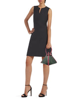 Buy now the Exotic Lia Handbag inspired by the geometric shapes of our designer's birth city Barcelona, and its world known artist, Antonio Gaudí, architect of the world wonder La Sagrada Familia. The Iconic Lia Green & Burgundy Handbag has a unique and functional pyramidal design able to fit all your essentials. 