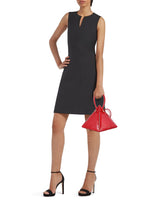 Buy now the Exotic Lia Handbag inspired by the geometric shapes of our designer's birth city Barcelona, and its world known artist, Antonio Gaudí, architect of the world wonder La Sagrada Familia. The Exotic Lia Croc-Embossed Passion Red Handbag has a unique and functional pyramidal design able to fit all your essentials. 